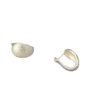 Minimalist matte silver hoop earrings with vintage brushed texture in a sleek streamline design
