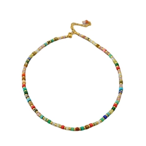 Colorful gemstone bead necklace with gold spacers and adjustable chain in ethnic style
