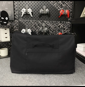 Macro shot of durable black nylon travel tote featuring a hidden zipper pocket and D-rings