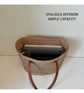 Top view showing the large capacity and fabric lining of this woven straw tote bag