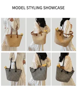 Detail view of large woven tote bag in brown and black styles with slender leather straps