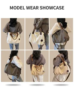 Detail view of large canvas tote bags in white, grey and beige with models and straps
