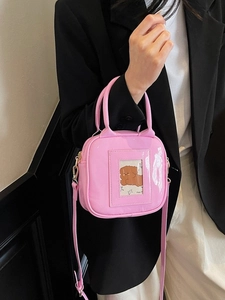 Pink patent leather square bag with cartoon card slot for stylish crossbody and handbag wear