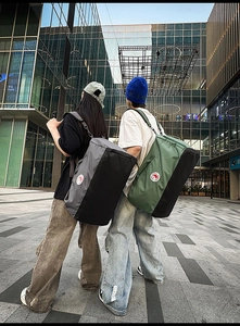 Macro view of multi-functional large capacity nylon tote bags in grey and green colors