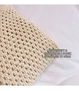 Gros plan détaillé du tissu tissé crème avec texture et motif de maille épaisse complexe