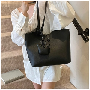 Black lychee texture tote bag set with matching mini pouch accessory for daily commuting