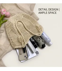 Macro detail of beige crochet tote bag showing hollow knit texture and spacious interior