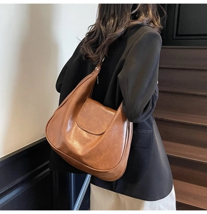 Brown vintage hobo bag with large capacity and soft faux leather texture for women