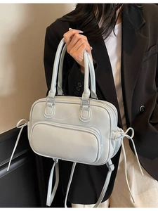 Light mint green PU leather handbag with bow ribbons and adjustable shoulder strap
