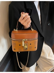 Brown bicolor bucket bag with bear monogram pattern and gold chain strap for women