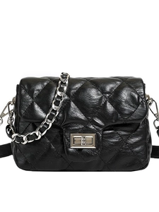 Quilted diamond pattern crossbody bag with silver chain strap and metal turn-lock