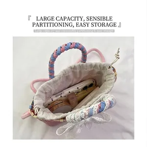 Detailed top view of a woven straw bucket bag showing interior storage for daily essentials