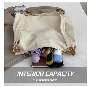 Top view showing the spacious interior of a beige tote bag filled with daily essentials