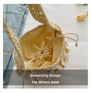 Detail view of woven bucket bag featuring yellow drawstring lining and hand-woven fiber