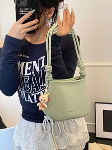 Light green mint bucket bag with knot shoulder strap and cute bunny pendant charm