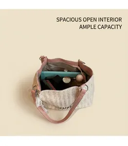 Macro view of woven straw tote bag interior with spacious capacity for daily essentials