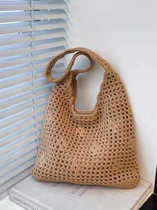 French minimalist hollow woven bucket bag in khaki cotton rope with a soft fabric liner