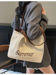 Fashionable straw tote bag with Summer embroidery and brown leather straps for daily use