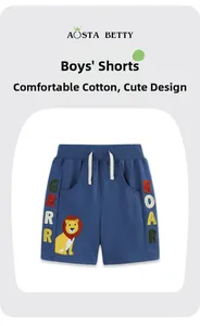 Detail of navy boy shorts with lion embroidery and GRRR ROAR lettering accents