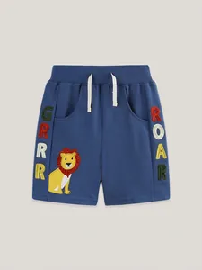 Boys navy blue cotton shorts with lion patch and colorful embroidery on elastic waist
