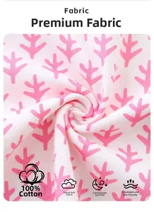Close-up of 100% cotton fabric with pink tree prints for breathable summer girls' clothing