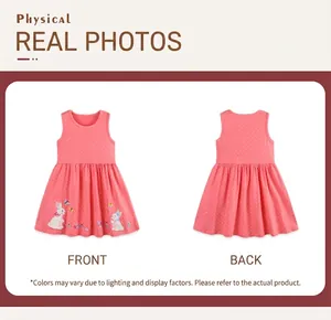 Close-up of pink polka dot sleeveless girl dress with rabbit and floral embroidery detail