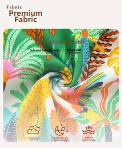 Gros plan sur le tissu en coton doux et respirant avec imprimés oiseaux tropicaux colorés