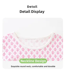 Detail of the soft ribbed round neckline on this pink printed toddler girls' summer set