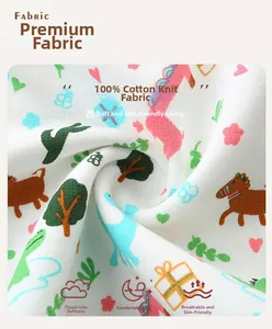 Close-up of soft breathable cotton knit fabric with colorful cartoon animal print