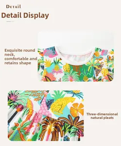Détails de la robe pour filles avec imprimés tropicaux et col rond aux finitions soignées