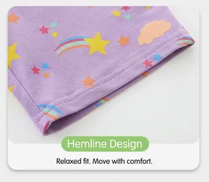 Detail shot of purple kids shorts featuring cartoon star prints and neat hem stitching