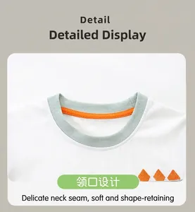 Detailed view of white cotton T-shirt neckline with green rib and orange embroidery