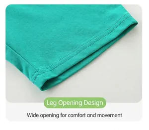 Détail de l'ourlet à double couture sur un short tricoté vert pour enfant au tissu doux