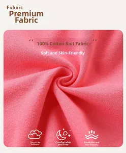 Gros plan détaillé du tissu en maille de coton rose montrant la texture douce et le tissage