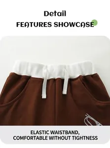 Détail du short pour garçon avec taille élastique côtelée blanche et cordon de serrage