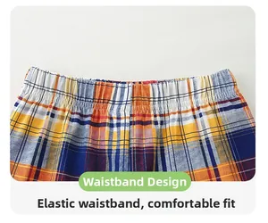 Detail of boys' checkered shorts showing the elastic waistband and flexible fit design