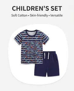 Detail showing cartoon vehicle prints and navy striped cotton fabric for kids' summer set