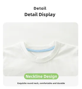 Detail view of the durable white cotton round neckline with reinforced blue piping