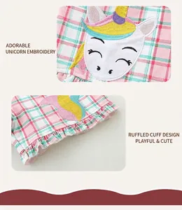Détails du short rose à carreaux pour fille avec broderie licorne et ourlet à volants
