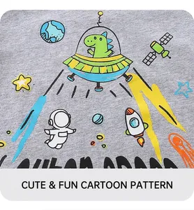 Close-up of gray cotton t-shirt with colorful dinosaur astronaut and space theme prints