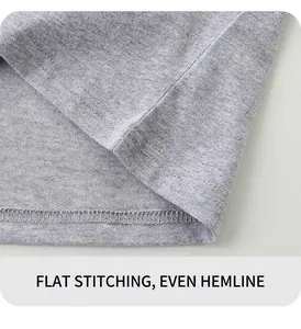 Close-up of boys' grey cotton T-shirt hem with professional double-needle flat stitching