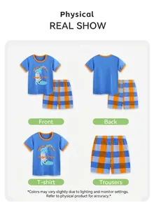 Detail of boys summer cotton set featuring blue crocodile T-shirt and plaid shorts