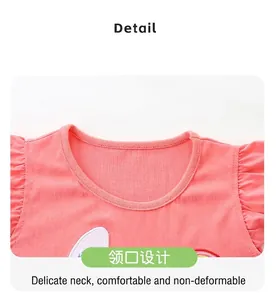 Close-up of pink knit kids' set showing detail of round neck and ruffle sleeves