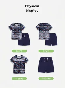 Detail view of boys summer set showing cartoon truck prints and drawstring waistband