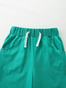 Short pour enfant turquoise en coton avec taille élastique et cordons blancs d'été