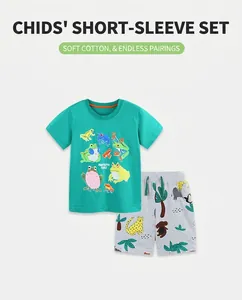 Detail of boys green frog t-shirt and grey printed shorts set in soft knitted cotton