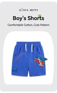 Detail of royal blue boys shorts featuring high-quality shark embroidery and cotton fabric