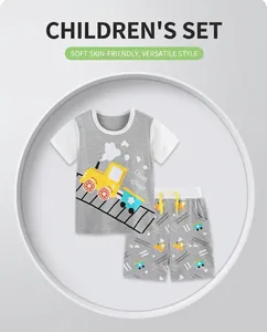 Detail view of cotton summer set featuring cartoon train print and contrast sleeves