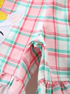 Short de sport fille à carreaux rose et vert avec broderie licorne et bord à volants