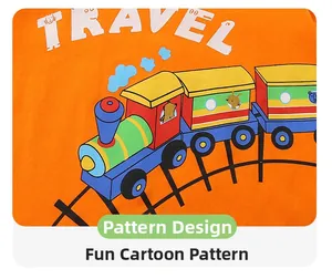 Détail du t-shirt orange pour enfant avec motif de train coloré et texte Travel